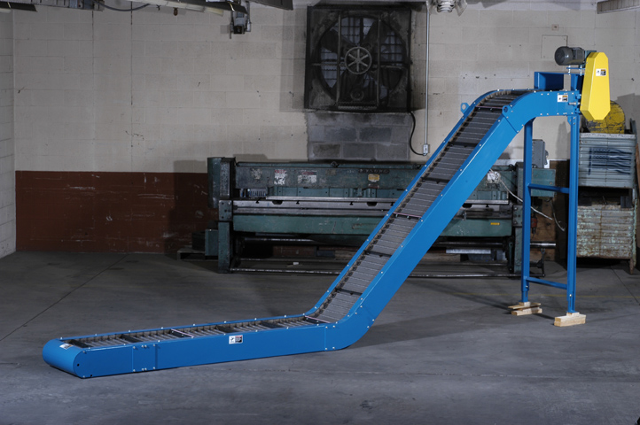 Angled side view of the blue colored Endura-Veyor 2.5 pitch hinged steel belt conveyor in D-style