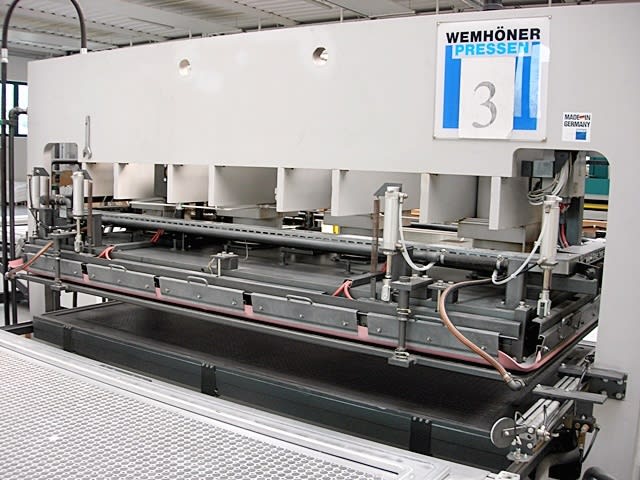 used pressing line machinery in a factory